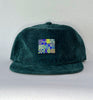 green cord flat brim hat - tonal quilt patch