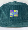 green cord flat brim hat - tonal quilt patch