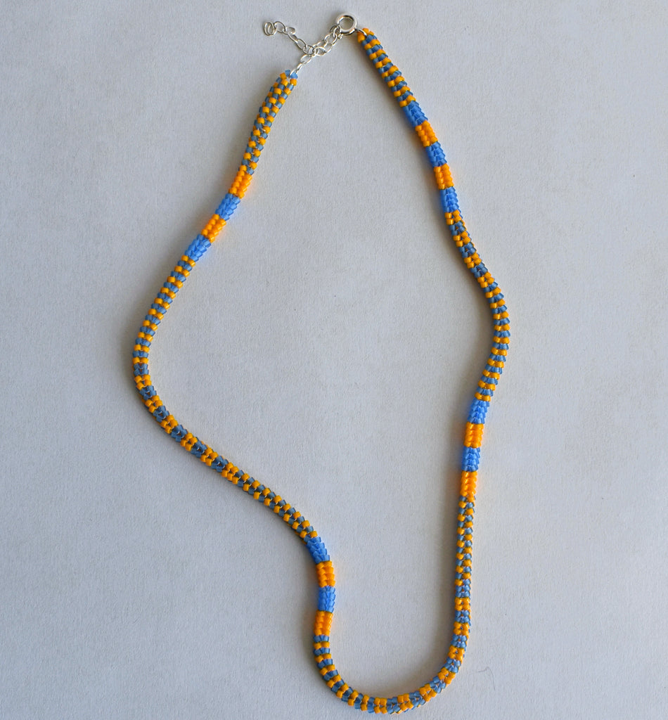 narrow patterns necklace - blue and mango