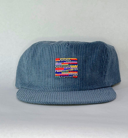 blue cord flat brim hat - stripes patch