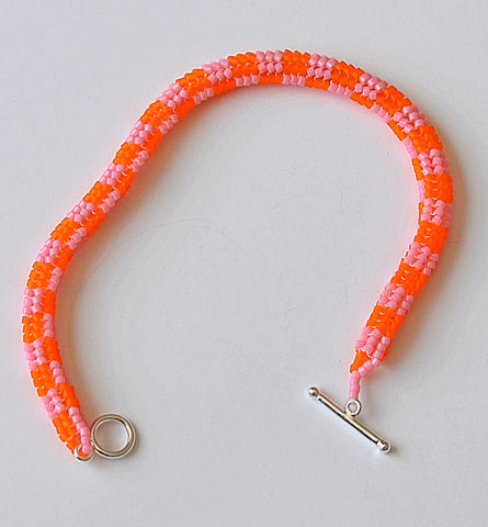 checkerboard rope bracelet - orange, pink